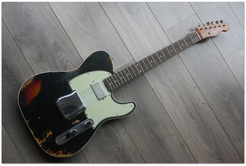 FENDER "Custom Shop Limited Rev Telecaster HS Heavy Relic, Antique Black over Three Tone Sunburst"