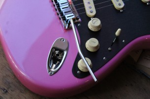 FENDER "American Ultra Stratocaster Bubble Gum Metallic w/Ebony Fingerboard & Anodized Black Pickguard "