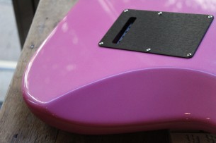 FENDER "American Ultra Stratocaster Bubble Gum Metallic w/Ebony Fingerboard & Anodized Black Pickguard "