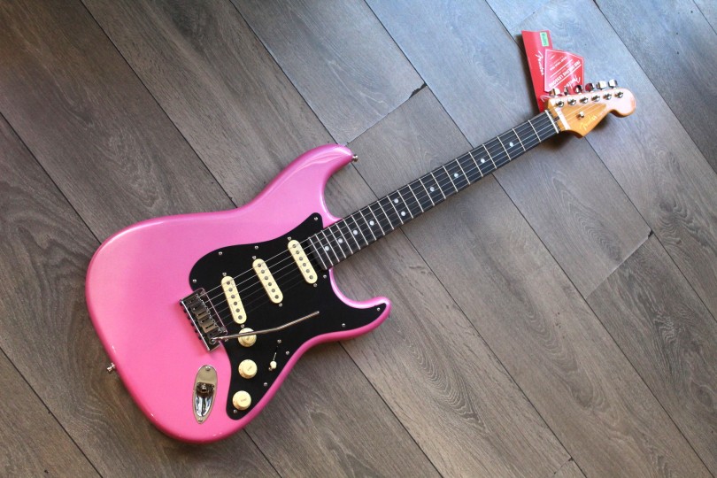 FENDER "American Ultra Stratocaster Bubble Gum Metallic w/Ebony Fingerboard & Anodized Black Pickguard "