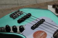 SQUIER Affinity Series Active Jazz Bass, Laurel Fingerboard, White Pickguard, Mystic Sea Foam Green