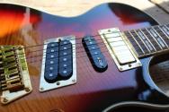 GIBSON "USA 20th Anniversary Nighthawk Standard Reissue "Fireburst" HARDCASE, PAPERS, 3, 12 KG